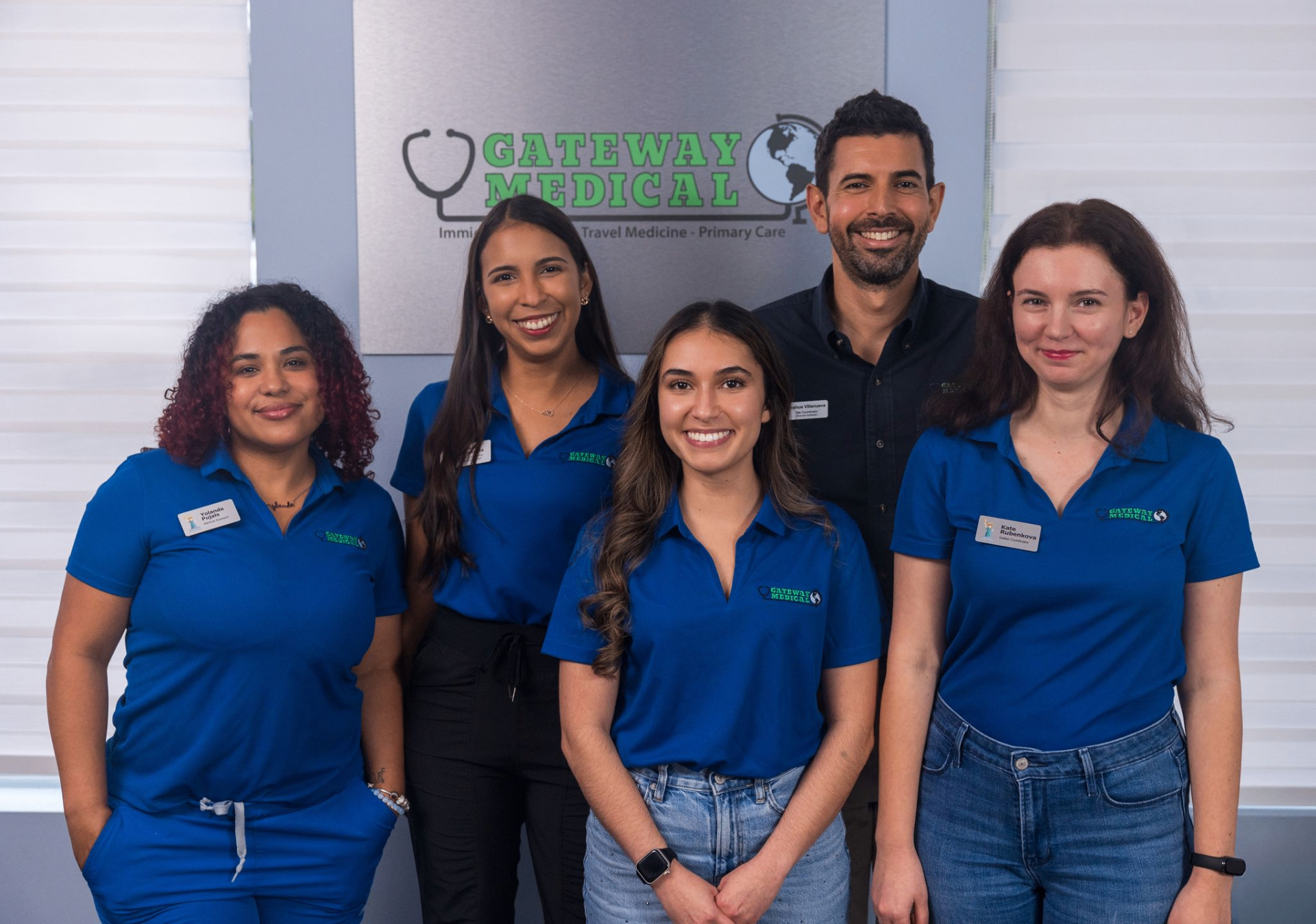 Gateway Medical team in front of the Gateway Medical sign